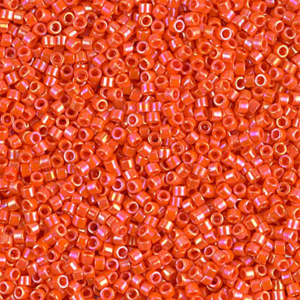 DB161 Opaque Orange AB 11/0 Miyuki Delica beads in vibrant shimmering orange cylinder seed beads
