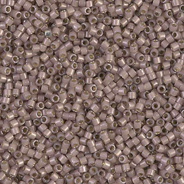 DB1460 Silver Lined Cinnamon Opal Delica 11/0 - Quantity: 5 grams