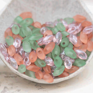 4x7mm Miyuki long magatama beads in pastel garden tones of green, peach, and soft pink