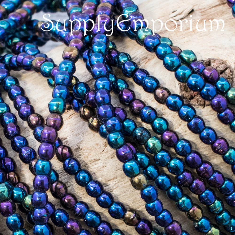 2mm Iris Blue Czech Druk - 100 Pieces - 4455