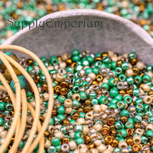 11/0 Toho seed beads in turquoise, copper, cream, and earthy tones in a mixed bead assortment