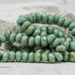 6x9mm Czech roller beads turquoise with light Picasso 12 pieces