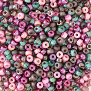 2/0 Czech Matubo seed bead mix in raspberry pink, berry red, green, and earthy tones with a soft matte and glossy blend