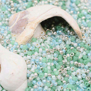 8/0 seed bead mix in coastal tones including mint green, aqua, pale blue, and soft beach neutrals