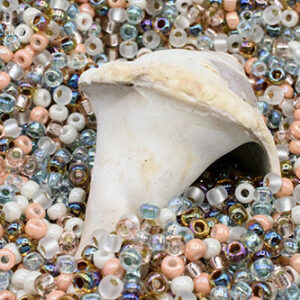 6/0 seed bead mix in nude beach colors featuring beige, cream, tan, soft peach, and natural sandy tones