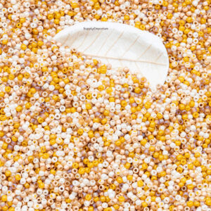 11/0 Toho seed beads in golden yellow, amber, cream, and warm earthy tones
