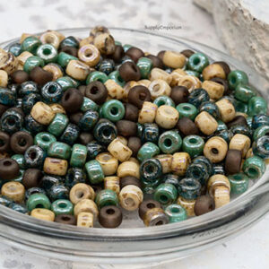 2/0 Czech Matubo seed beads in jade green, turquoise, tan, and earthy natural tones