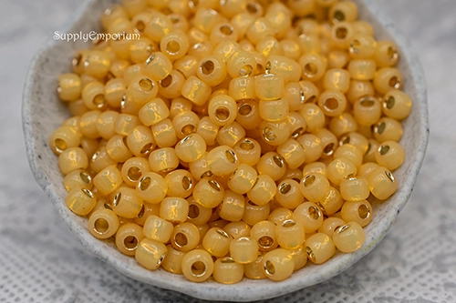6/0 S/L Milky Light Topaz Toho Seed Bead - Quantity: 15 grams - 2912R - Image 2