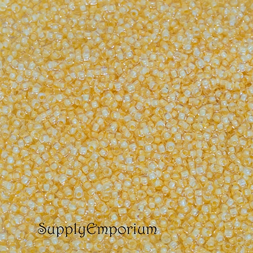 11/0 Butter Lined Crystal Toho Seed Bead - Quantity: 10 grams - 4324R