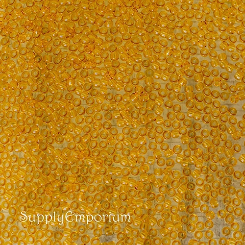 11/0 Transparent Medium Topaz Toho Seed Bead - Quantity: 10 grams - 5984