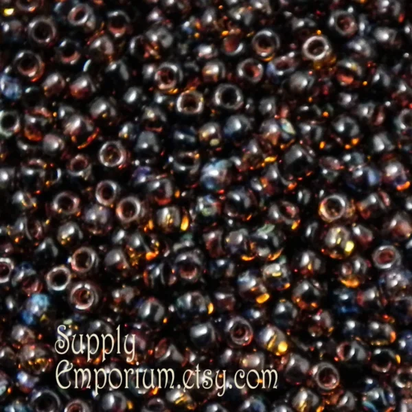 8/0 Hybrid Transparent Light Topaz Picasso Toho Seed Bead - Quantity: 14 grams - 2031