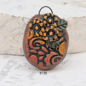 polymer clay floral pendant with handpainted stamped flower details