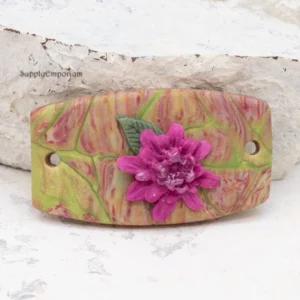 polymer clay floral 2-hole connector pendant with raised flower and leaf details