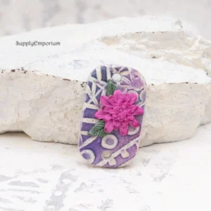polymer clay floral 2-hole connector pendant with raised flowers and leaf details