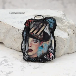 polymer clay face pendant with blue eyed woman image transfer artwork