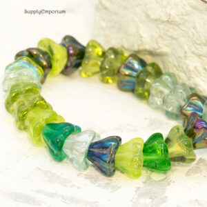 6x8mm Czech glass bell flower beads in evergreen tones of green, lime, and fresh natural hues