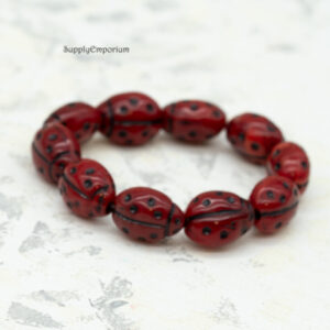 Black and red Czech glass ladybug beads