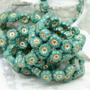 7mm dark turquoise Czech Hawaiian flower beads with gold wash