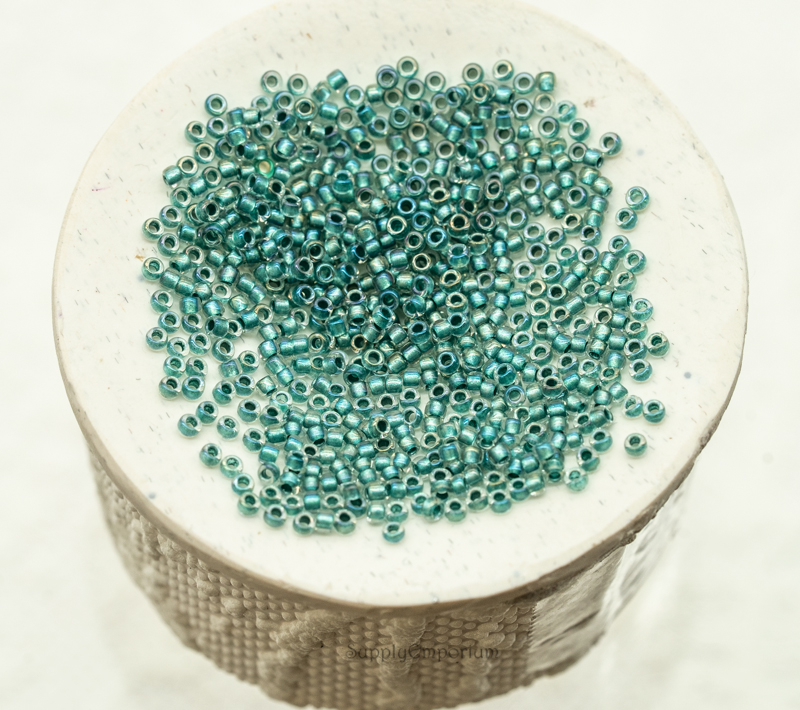 15/0 Toho Seed Beads - Teal Lined Crystal Rainbow, 15-264 (5 Grams) 6369R - Image 2