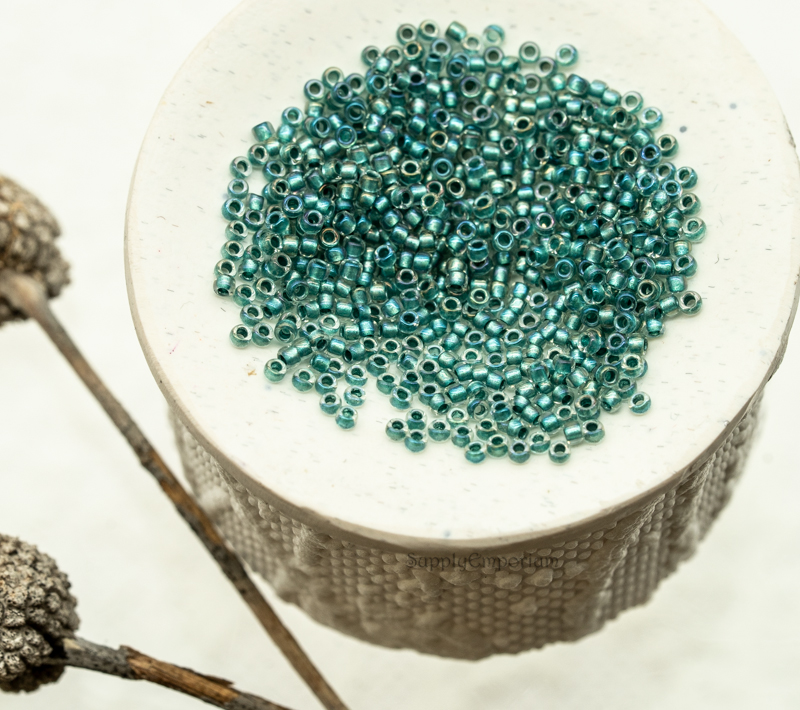 15/0 toho seed beads teal lined crystal rainbow 15-264
